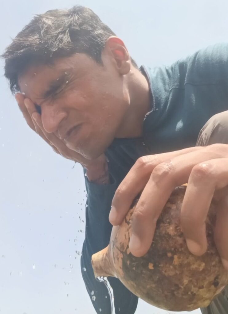 Washing face with fresh water 50 Km away from Bangalore